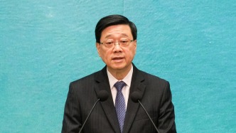 李家超赴京列席全国人大会议开幕会