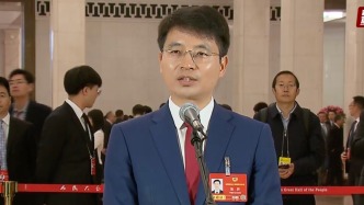 直击两会丨全国政协委员张桥揭秘身份证光学防伪“黑科技”