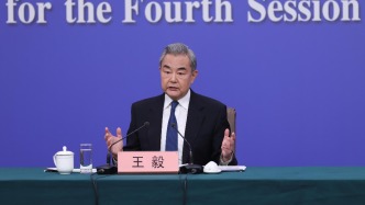 两会外长会｜王毅：绝不允许任何人、任何势力把80多年前光复的台湾再从中国分裂出去