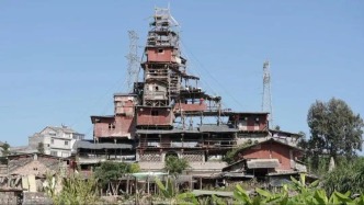 美国奇幻“叠叠乐”小屋：高56米，十几层建筑像蛋糕一样堆叠而成