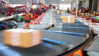 具身机器人开始走进仓库，去年我国物流技术有效助力降成本