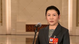 司法部部长贺荣：今年将在全国统一推行“扫码入企”