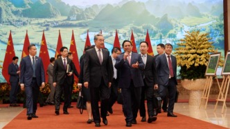 越南總理范明政會見王毅一行