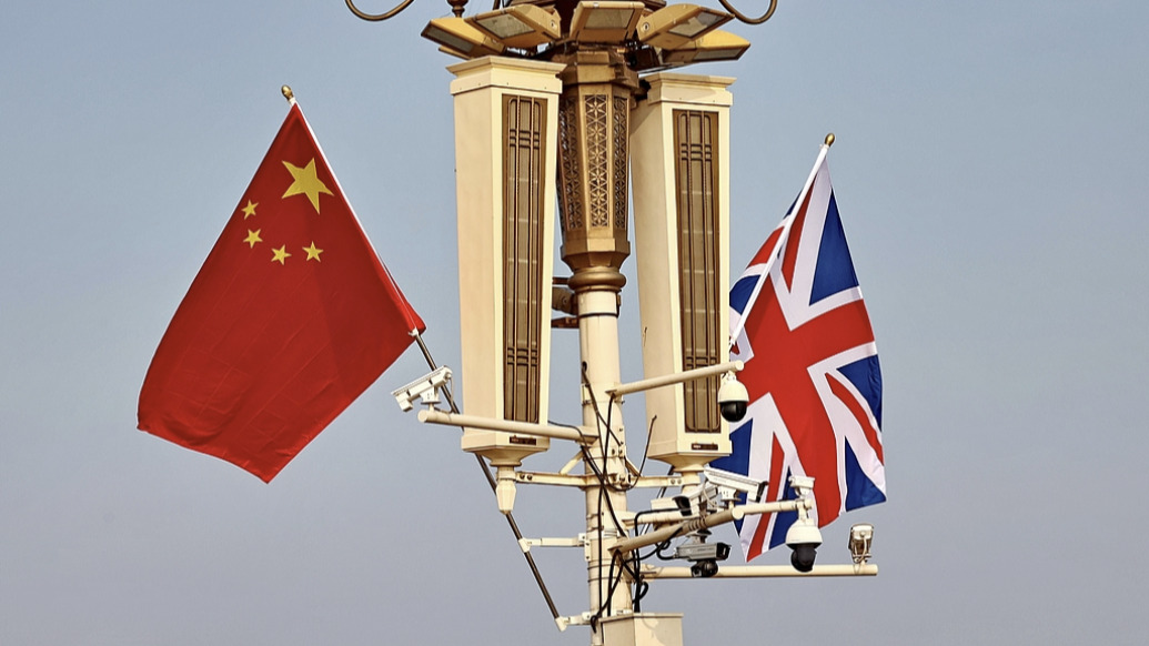 王毅会见英国首相国家安全事务顾问鲍威尔