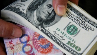 一季度人民币对美元汇率升超1.1%，中间价升超1.55%