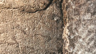 龙门石窟新发现鸠摩罗什译本唐刻《金刚经》