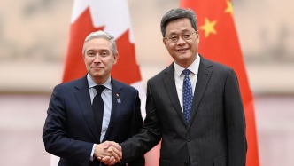 财政部部长蓝佛安会见加拿大财政部部长商鹏飞