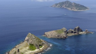 中國海警艦艇編隊4月14日在我釣魚島領(lǐng)海巡航