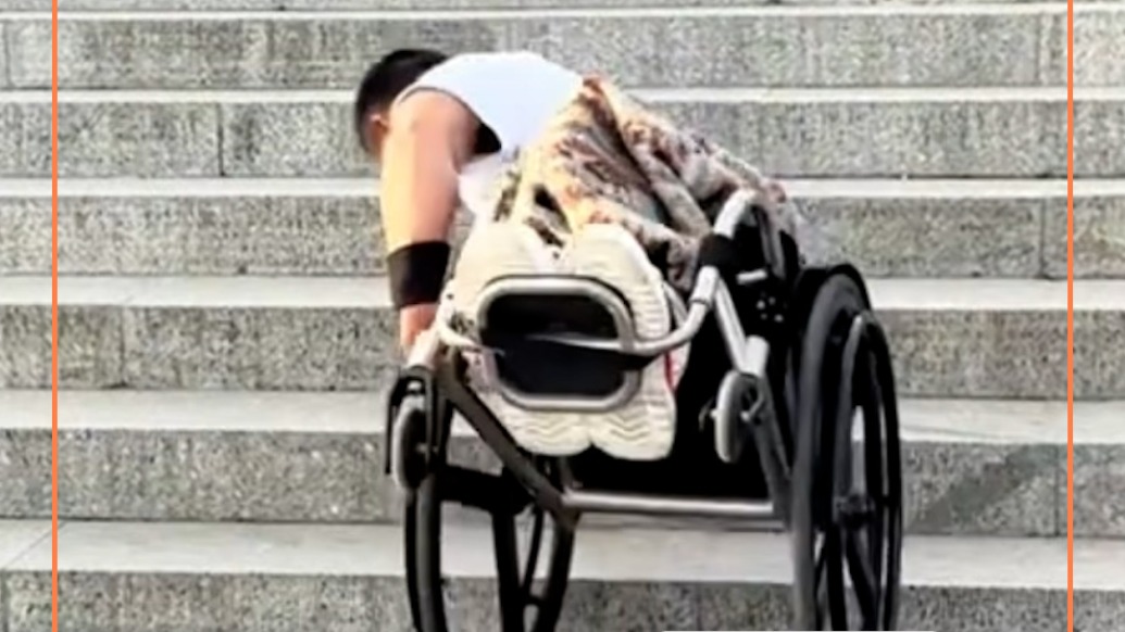 以雙臂為足，殘疾人高山滑雪冠軍挑戰(zhàn)登泰山