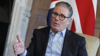 英国下议院否决调查首相动议