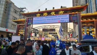 辽宁锦州市委大院，在夜市打了条广告