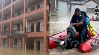湖南石门遭遇极端强降雨天气，一所中学被淹救援人员连夜转移五六百名学生