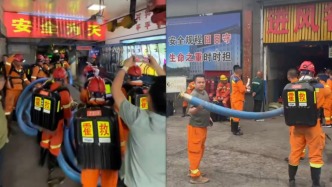 山西沁源煤矿事故最新救援画面：爆炸点附近出现积水，多名救援人员携抽水管下井