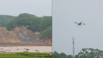 直击南宁洪灾丨横州六蓝水库坝体缺口已无洪水漫出，无人机吊运瓶装水进村