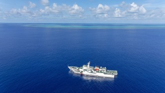人民日报钟声：南海不是“游猎园”，更非“角斗场”
