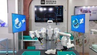 得物App参展2026世界人工智能大会，全球首个AI鉴别机器人首发亮相
