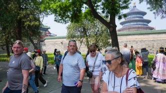 人民日报和音：火热“中国游”彰显开放中国新气象