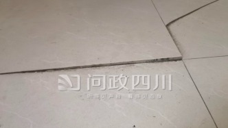 四川郫都一安置小区居民称地面塌陷多年投诉无门，街道办：水管爆管所致，已修复