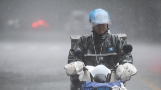 上海明天中午前仍有明显风雨