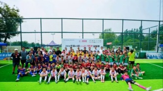 谌贻琴观摩北京青少年足球“百队杯”：加快建设足球青训体系