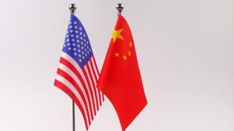 王毅会见美国驻华大使庞德伟