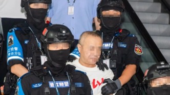 在菲绑架团伙头目邱某某被成功遣返回国