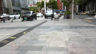 路面井盖凸起影响通行,如何守住市民脚下出行安全?
