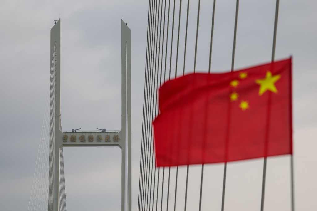一周图片｜中朝新鸭绿江大桥开通，厄尔尼诺引发南美多国洪灾