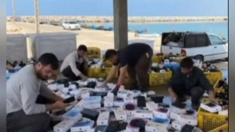 明查｜霍尔木兹海峡散落大量苹果手机？网传视频多为AI生成
