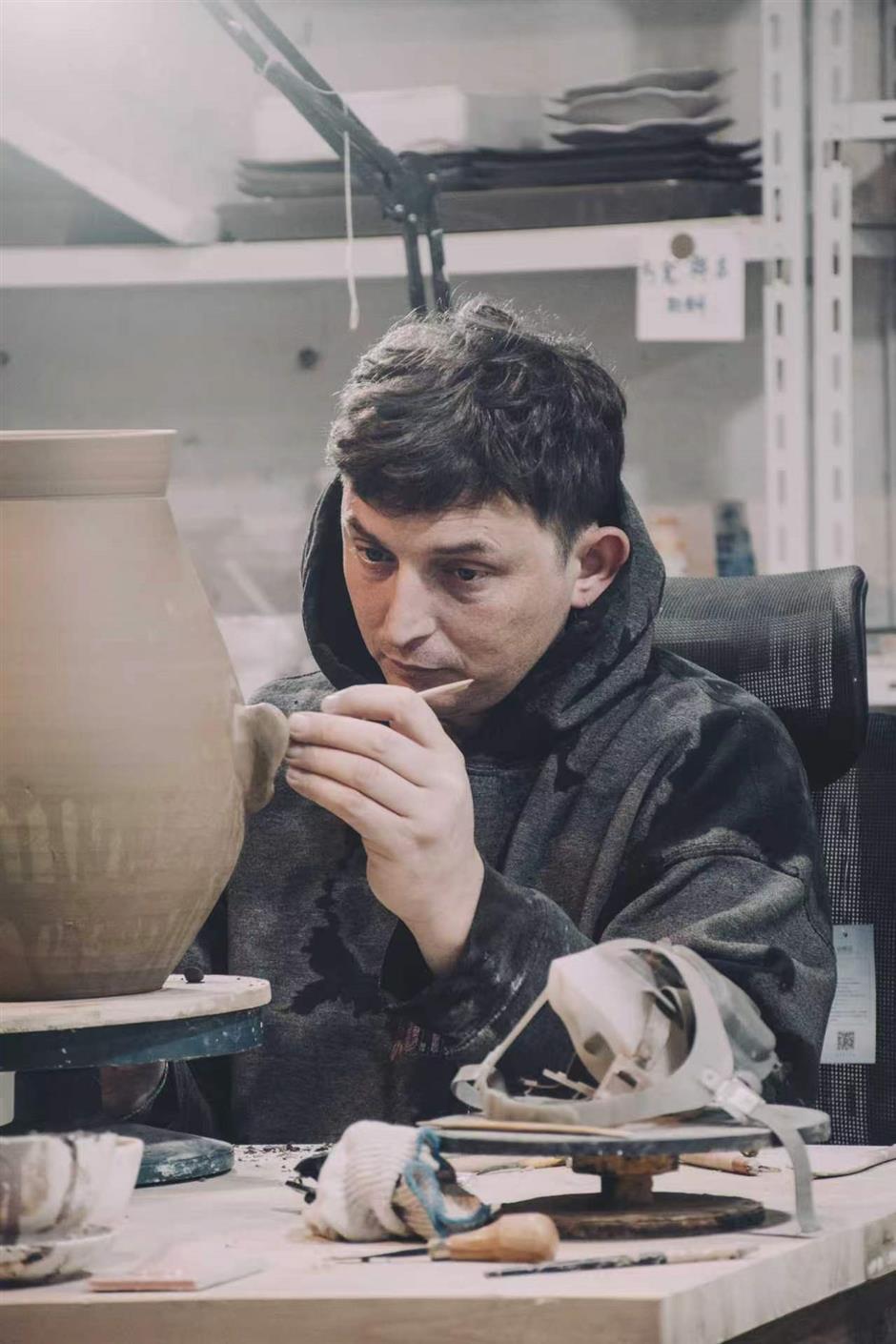 He Thought He'd Stay 4 Weeks. The Porcelain City Kept Him