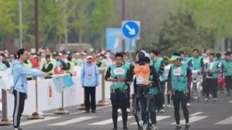 全球首個人形機器人半馬賽結束后，誰更興奮了？