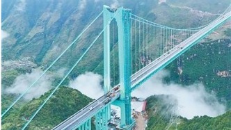 近4萬根毫米級(jí)鋼絲拉起世界第一高橋