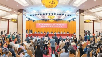 十四届全国人大四次会议海南代表团举行开放团组活动，冯飞刘小明等代表回答中外记者提问