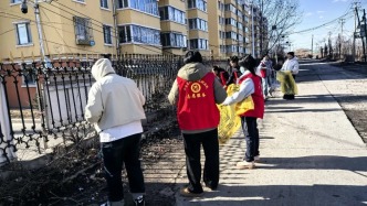 文明實(shí)踐在行動(dòng) 環(huán)境整治暖民心