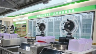 锅圈开小炒店：AI炒菜机器人掌勺，3分钟现炒出餐，不设堂食