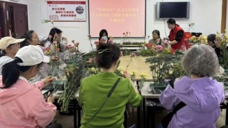 重慶楊家坪街道天寶路社區(qū)開(kāi)展“我是非遺傳承人”主題插花活動(dòng)