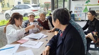 荆门市团林铺卫生院开展上门送报告、面对面答疑服务
