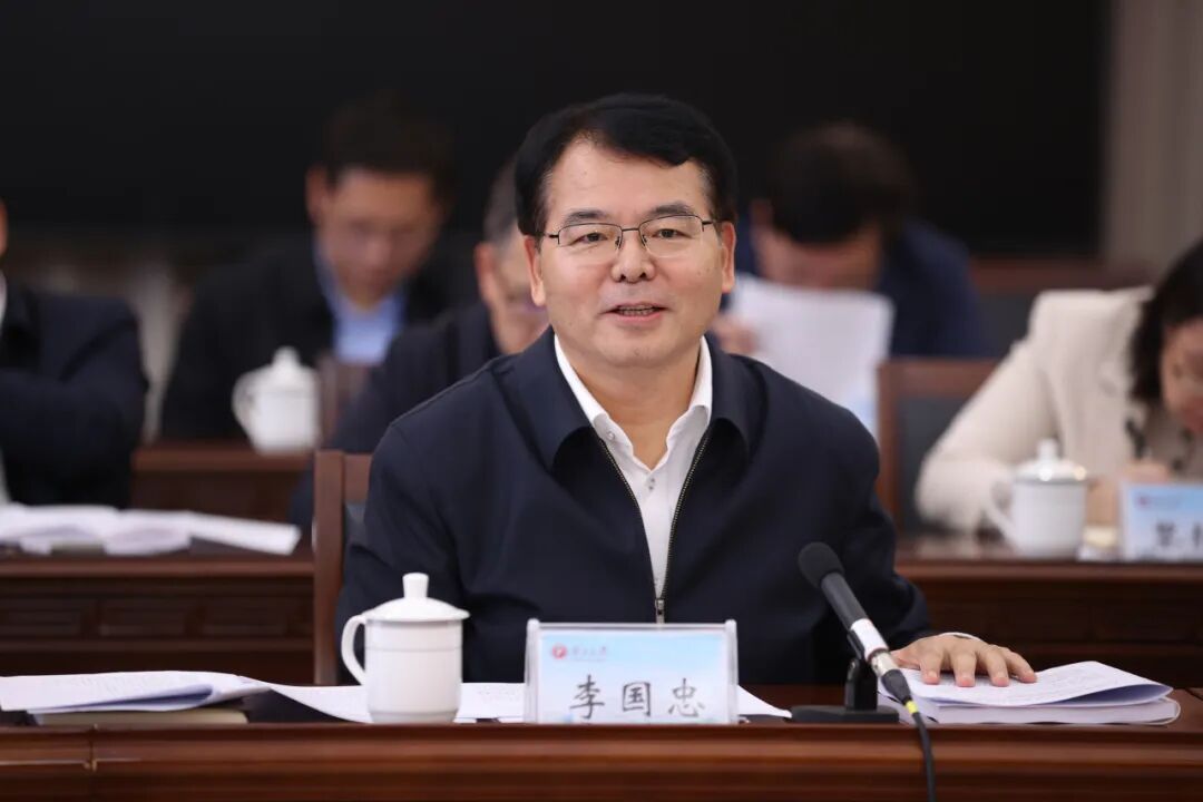 黄学军,罗真率队拜访广西大学党委书记李国忠