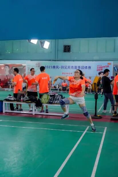 Spectators cheering enthusiastically from the sidelines.